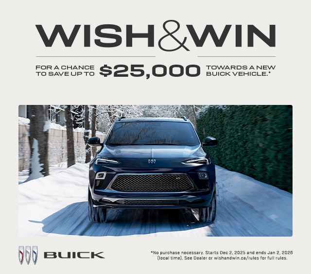 Buick SUV on a snowy road promoting the "Wish & Win" contest for up to $25,000 savings.