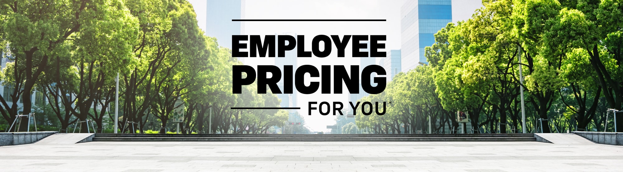 "Employee pricing advertisement in park setting with trees and modern buildings."