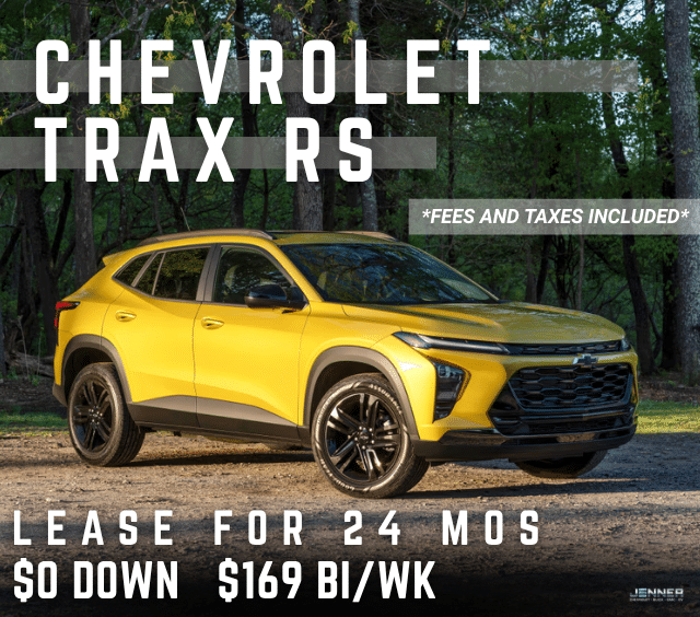 Yellow Chevrolet Trax RS parked in a wooded area, lease offer for $169 bi-weekly, $0 down, 24 months.
