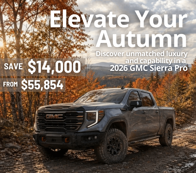 2026 GMC Sierra Pro truck in autumn forest, save $14,000, starting from $55,854. Promoting luxury and capability.