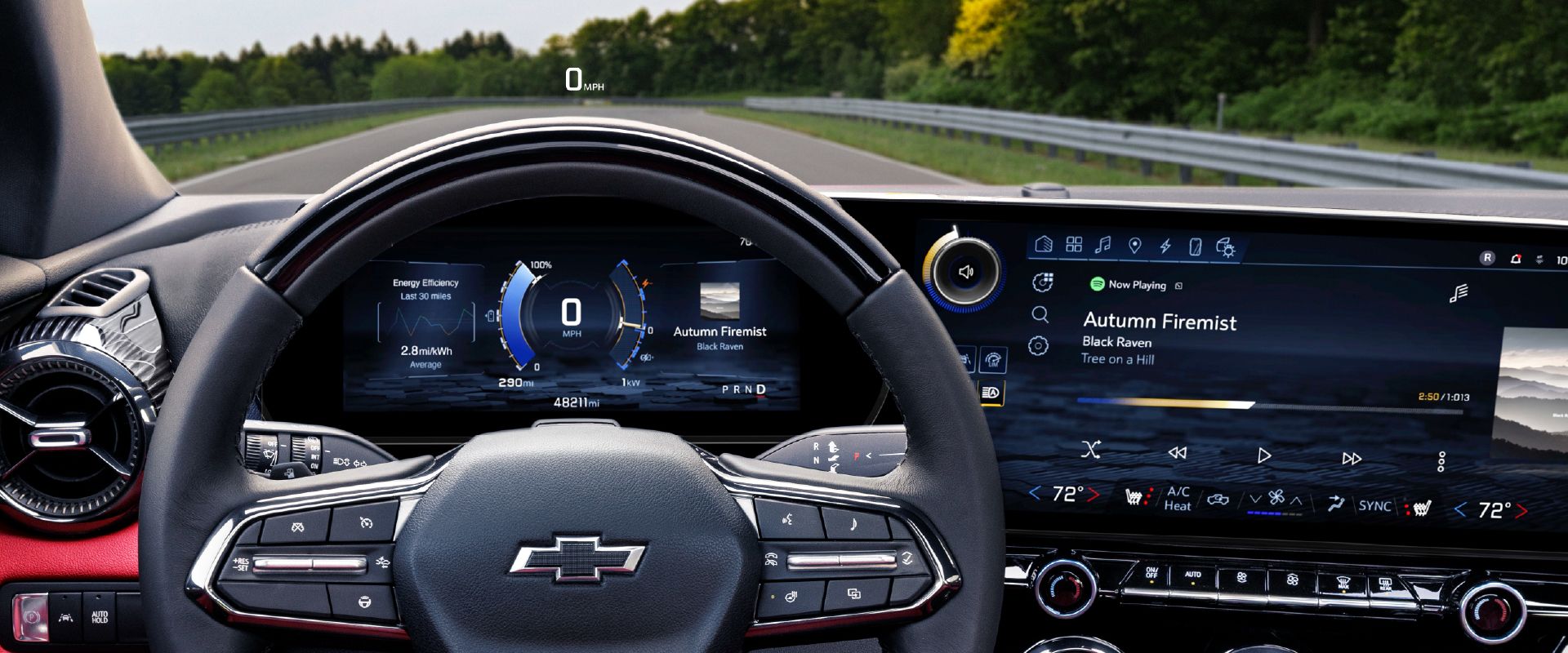 Car dashboard with digital display showing speed, audio track "Autumn Firemist," and energy efficiency data.