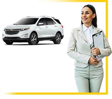 Woman in business attire holding a clipboard next to a white SUV, possibly a Chevrolet Equinox.